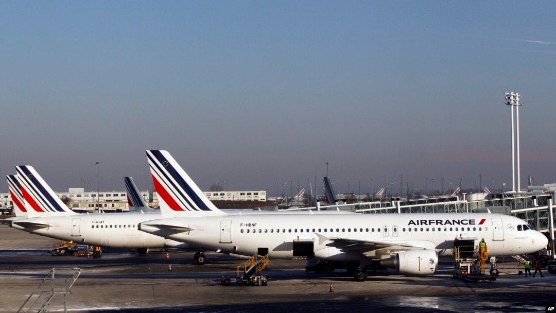 FILE - Air France planes are parked on the tarmac at Paris Charles de Gaulle airport, in Roissy, near Paris, Feb. 7, 2012. 