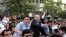 Iranian presidential candidate, Mohammad Bagher Qalibaf, who is also Tehran's mayor, points, during a campaign rally in Tehran, Iran, June 12, 2013.