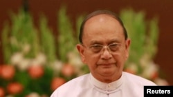 FILE - Myanmar's President Thein Sein, shown in Naypyitaw Aug. 8, 2014, has pledged to have cease-fire pacts with all ethnic groups before leaving office in 2015. 