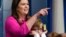 White House press secretary Sarah Sanders, standing next to her son Huck Sanders, calls on a child during a briefing at the White House in Washington, April 25, 2019. Children of journalists and White House staff were invited to attend the briefing and ask Sanders questions.
