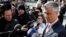 Kosovo's Prime Minister Hashim Thaci (R) talks to the media as he arrives for a meeting with Serbian Prime Minister Ivica Dacic (unseen) and European Union foreign policy chief Catherine Ashton (unseen) in Brussels, April 2, 2013. 