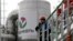 An employee talks on a portable radio set at Bashneft - Novoil refinery in the city of Ufa, Russia, April 11, 2013.