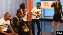 Jomion and the Uklos play a song during their performance on Music Time in Africa for host Heather Maxwell of VOA's Africa 54. (Photo by David Byrd)