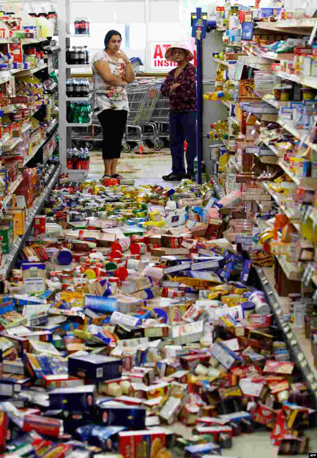 August 23: Debris covers the floor of the Miller's Mart food store in Mineral, Va., a small town near the earthquake's epicenter. The most powerful earthquake to strike the East Coast in 67 years shook buildings from South Carolina to Maine. (AP Photo/Ste