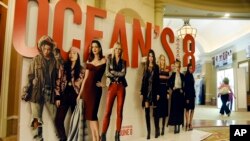 An oversized movie advertisement for the upcoming film "Ocean's 8," featuring an all-female starring cast, is pictured on day one of CinemaCon 2018, the official convention of the National Association of Theatre Owners, at Caesars Palace in Las Vegas, Apr