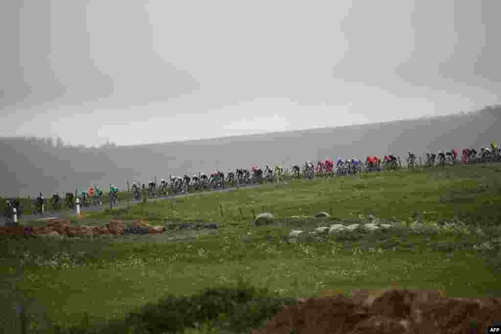 The pack rides during the second stage of the 71st edition of the Criterium du Dauphine cycling race, 180 km between Mauriac and Craponne-sur-Arzon, France.