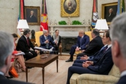 Mexico's President Andres Manuel Lopez Obrador and U.S. President Donald Trump hold a meeting at the White House, in Washington, July 8, 2020.