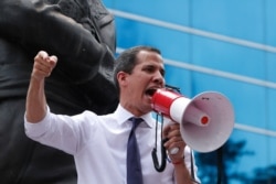 Venezuela's self-proclaimed interim President Juan Guaido speaks during a protest in Caracas, Venezuela, July 5, 2019.