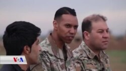 Hevpeyvîna Taybet bi Berdevikê Koalîsyonê Kolonel Myles Caggins re