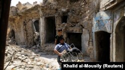 دیمەنێکی ڕۆژانی پاش شەڕی ئازادکردنەوەی موسڵ