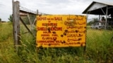 Bullet holes are seen in an abandoned fuel depot sign in the town of Malakal, in the Upper Nile state of South Sudan, Sept. 8, 2018. 