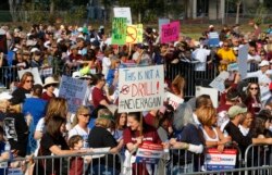 FILE - Participants gather during the March For Our Lives-Parkland event, March 24, 2018, in Parkland, Fla.