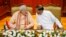 India's Prime Minister Narendra Modi (L) talks to Sri Lanka's President Maithripala Sirisena at the Presidential Secretariat in Colombo, March 13, 2015. 