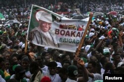 FILE - People gather as opposition leader Joseph Boakai launched his campaign ahead of October elections, in Monrovia, Liberia September 17, 2023.