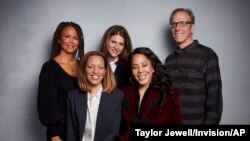 FILE - Sil Lai Abrams, back row from left, director Amy Ziering, director Kirby Dick, Drew Dixon, seated left, and Sheri Hines pose for a portrait to promote the film "On the Record" at the Music Lodge during the Sundance Film Festival in Park City, Utah.