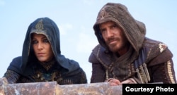 Michael Fassbender and Marion Cotillard in a scene from "Assassin's Creed" (Photo courtesy 20th Century Fox)