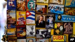 Refrigerator magnets are displayed for sale in a tourist shop, several showing images of U.S. President Barack Obama, at a market in Havana, Cuba, March 14, 2016. Obama will travel to Cuba on March 20.