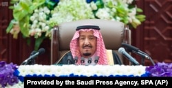 Saudi King Salman gives his annual policy speech in the ornate hall of the consultative Shura Council, Nov. 19, 2018, Riyadh, Saudi Arabia.