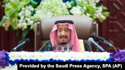 Saudi King Salman gives his annual policy speech in the ornate hall of the consultative Shura Council, Nov. 19, 2018, Riyadh, Saudi Arabia. 