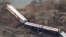 Emergency rescue personnel work the scene of a Metro-North passenger train derailment in the Bronx borough of New York, Dec. 1, 2013. 