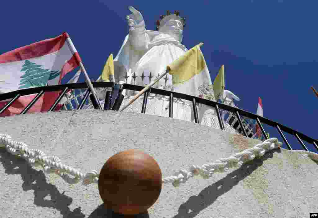 A two-kilometer-long rosary, which is said to be the longest rosary in the world, hangs around the Marian shrine at Our Lady of Lebanon religious site in Harissa, northeast of Beirut, Lebanon. By tradition, May is the month of devotion to the Virgin Mary for the Catholic Church.