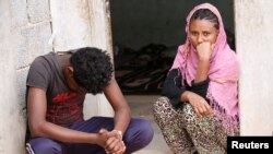 Migrants are seen in the town of Bani Walid, Libya, March 25, 2018.