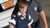 Charleston, S.C., shooting suspect Dylann Storm Roof is escorted from the Cleveland County Courthouse in Shelby, N.C., Thursday, June 18, 2015.