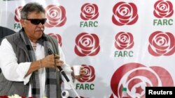 Colombia's Marxist FARC Jesus Santrich gestures during a news conference in Bogota, Colombia, Nov. 16, 2017. 