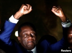 FILE: Zimbabwe's former vice president Emmerson Mnangagwa, who is to be sworn in to replace Robert Mugabe as president, addresses supporters in Harare, Zimbabwe, Nov. 22, 2017.