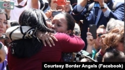 Gabriela Esparza was able to hug her mother and sister on April 30 during a symbolic event when an emergency door at the U.S.-Mexico border in California was opened for a brief time. 