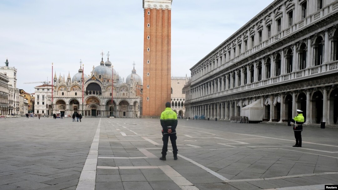 The almost empty St. Mark?s Square is seen after the Italian government imposed a virtual lockdown on the north of Italy including Venice to try to contain a coronavirus outbreak, in Venice, Italy, March 9, 2020. REUTERS/Manuel Silvestri.