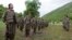 Kurdistan Workers Party (PKK) fighters stand at formation in northern Iraq, May 14, 2013. 