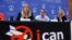 FILE - Beatrice Fihn, executive director of the International Campaign to Abolish Nuclear Weapons (ICAN), and other members of the organization attend a news conference after ICAN won the Nobel Peace Prize 2017, in Geneva, Switzerland, Oct. 6, 2017.
