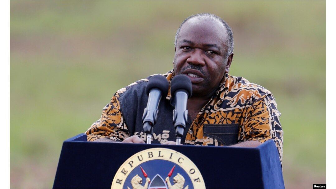 FILE - Gabon's President Ali Bongo addresses the media at Nairobi National Park near Nairobi, Kenya, April 30, 2016.