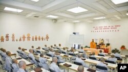 A class of boys receives instruction at the Hsi Lai Temple in Los Angeles, California