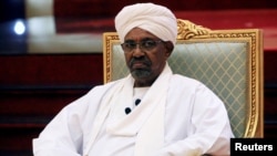 FILE - Sudanese President Omar al-Bashir addresses the National Dialogue Committee meeting at the Presidential Palace in Khartoum, Sudan, April 5, 2019. 