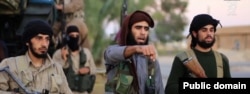 FILE – A screen grab of purported Islamic State video.