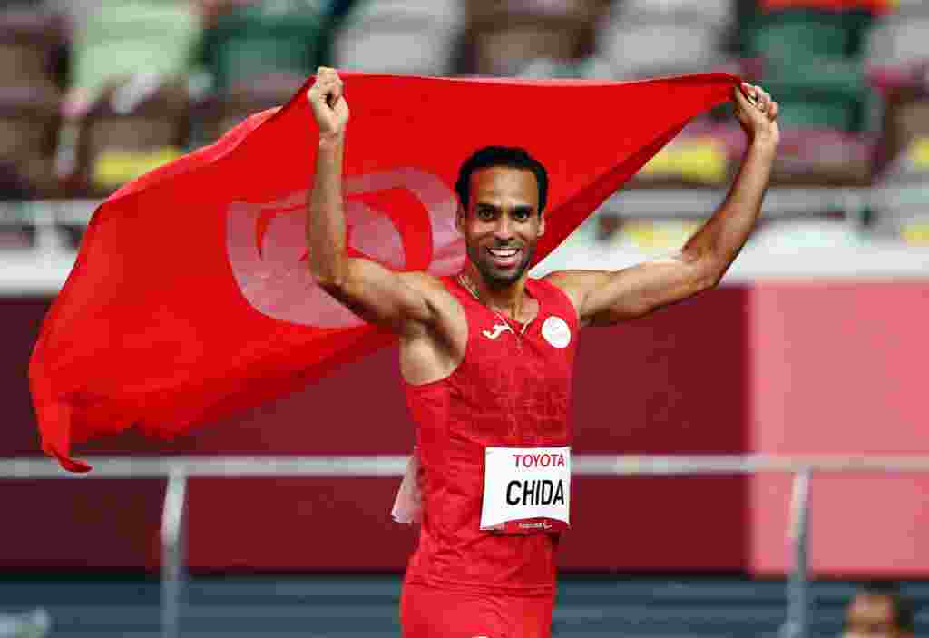 Mohamed Farhat Chida of Tunisia celebrates after winning the silver medal. REUTERS/Athit Perawongmetha