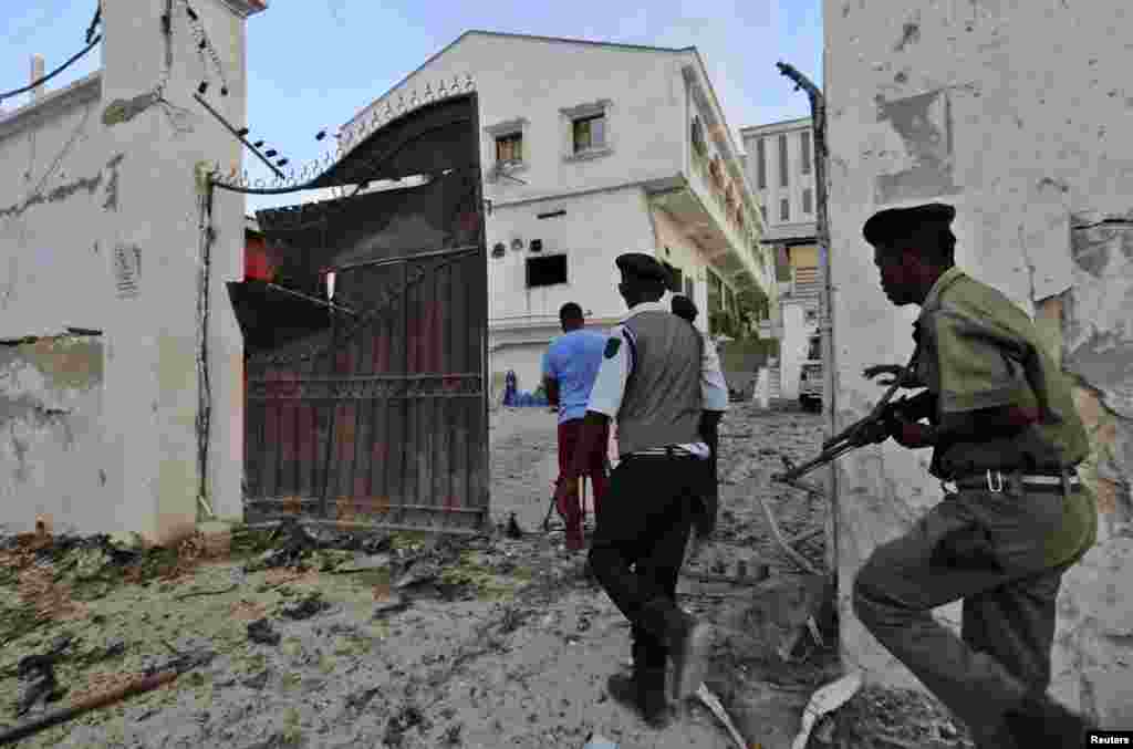 Somali police take position after Islamist group al Shabaab attacked Maka Al-Mukarama hotel in Mogadishu.