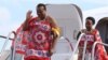 FILE - King of Swaziland Mswati III and one of his 13 wives disembark from a plane after arriving at Katunayake International airport in Colombo, Sri Lanka, Aug. 13, 2012. 