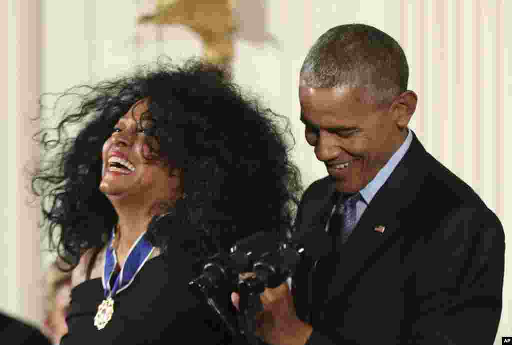President Barack Obama presents the Presidential Medal of Freedom to Diana Ross during a ceremony in the East Room of the White House, Nov. 22, 2016, in Washington.