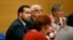 Former President Macron's security aide Alexandre Benalla (L) appears before the French Senate Laws Commission prior to his hearing, in Paris, France, Sept. 19, 2018.