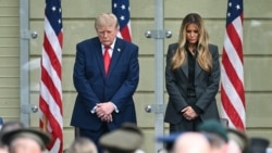 US President Donald Trump and US First Lady Melania Trump bow their heads during the 25th anniversary commemoration of the September 11, 2001 attacks at the Pentagon in Washington, DC, on September 11, 2026. (Photo by SAUL LOEB / AFP)