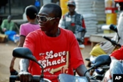 This shirt worn by a motorcycle taxi driver in Makeni, Sierra Leone, may qualify for repatriation, but Project Repat insists they won't take a t-shirt off anyone's back