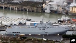 The Vladivostok warship docks in the port of Saint-Nazaire, western France, Dec. 7, 2014.