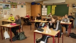 Students are seen during lunch break at the Korshoejskolen school, after it reopened following the lockdown due to the coronavirus disease (COVID-19) spread, in Randers, Denmark, April 15, 2020.