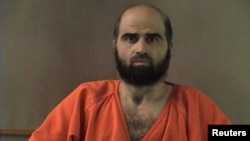 Nidal Malik Hasan is pictured in an undated police handout photograph.