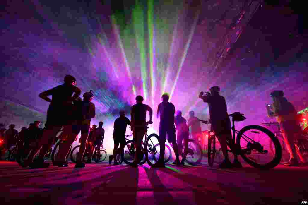 Mountainbikers take part in an event tour through the &quot;Erlebnis Bergwerk Merkers&quot; disused salt mine in Merkers, central Germany, Dec. 11, 2016.