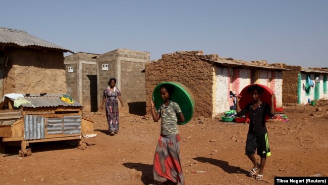 File: Eritrean refugee children walk within Mai-Aini refugee camp near the Eritrean boarder in the Tigrai region in Ethiopia February 10, 2016.