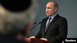 Vladimir Putin pronuncia un discurso durante un evento del Día Internacional del Holocausto y el 75 Aniversario del Asedio de Leningrado, en Moscú, el 29 de enero.